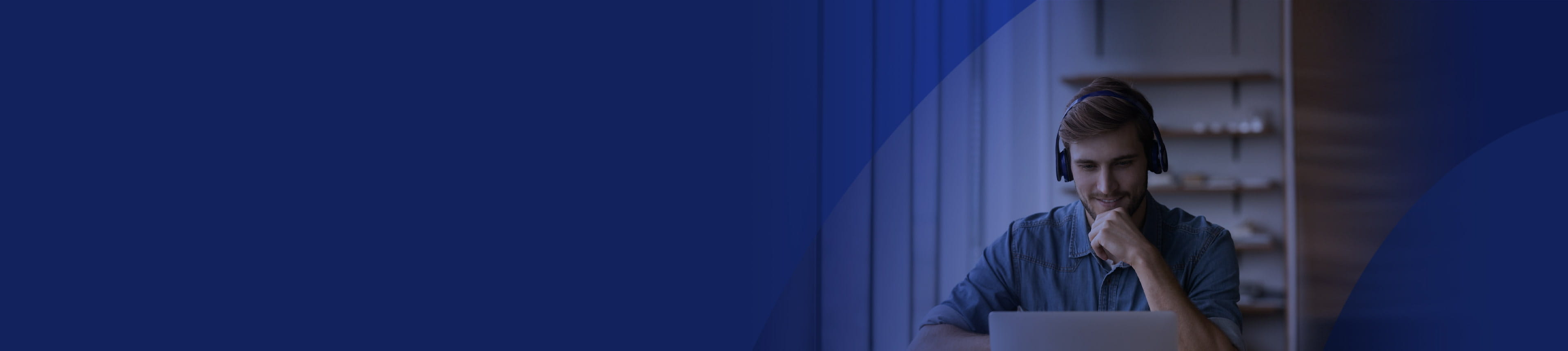 Man watching content on laptop